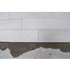 Ceramic wood effect tiles and tools for tiler on the floor  unfinished laying floor tiles  Floor tiles installation