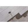 Ceramic wood effect tiles and tools for tiler on the floor  unfinished laying floor tiles  Floor tiles installation