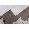 Ceramic wood effect tiles and tools for tiler on the floor  unfinished laying floor tiles  Floor tiles installation