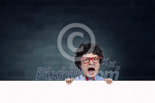 Young funny man in glasses with big head Young funny man in glasses with big head