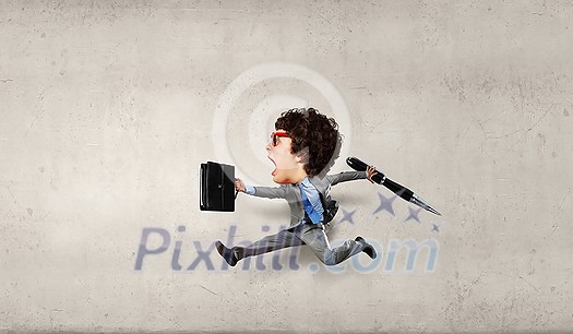 Funny picture of running man with big head over cement background Funny picture of running man with big head over cement background