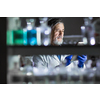 Senior male researcher carrying out scientific research in a lab (shallow DOF; color toned image)