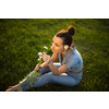 Pretty, young woman in a lovely park, enjoying some free time on a weekend (color toned image)
