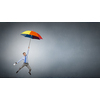 Young businessman flying high in sky on umbrella