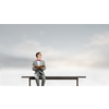 Young businessman wearing red bow tie sitting on bench with book in hands