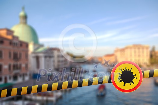 Prohibition yellow sign with model of Coronavirus molecule on a warning fencing ribbon on a blurred background of Grand Canal in Venice, Italy. Coronavirus, Covid 19 pandemic, Quarantine concept. Prohibition yellow sign with model of Coronavirus molecule on a warning fencing ribbon on a blurred background of Grand Canal in Venice, Italy. Coronavirus, Covid 19 pandemic, Quarantine concept.