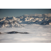 Splendid apline scenery. High mountains with fog and lovely evening light.