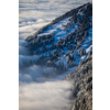 Splendid apline scenery. High mountains with fog and lovely evening light.