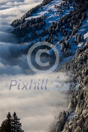 Splendid apline scenery. High mountains with fog and lovely evening light. Splendid apline scenery. High mountains with fog and lovely evening light.