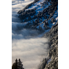Splendid apline scenery. High mountains with fog and lovely evening light.