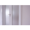 double glass door with white wooden frame in empty room interior