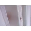 double glass door with white wooden frame in empty room interior