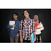 Arabic teenagers, students group  portrait against black chalkboard wearing backpack and books in school