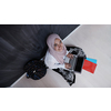 arab female student working on laptop from home  top view