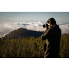 Photographer taking photos of a lovely landscape