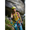 Pretty, female climber on a via ferrata - climbing on a rock in Swiss Alps