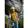 Pretty, female climber on a via ferrata - climbing on a rock in Swiss Alps