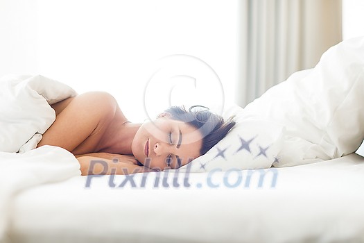 Beautiful young woman sleeping in bed Beautiful young woman sleeping in bed