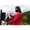 Guests in restaurant Washing hands using automatic gel disinfection sanitizer.  Coronavirus prevention in a caffee restaurant   during the corona virus epidemic and new normal outbreak concept