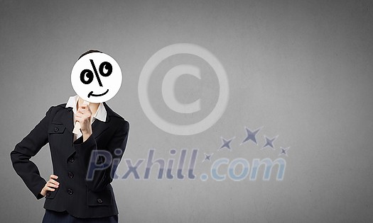 Unrecognizable businesswoman hiding her face behind mask Unrecognizable businesswoman hiding her face behind mask