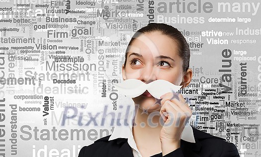Happy cute girl trying male paper mustache Happy cute girl trying male paper mustache