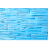 Creative background from medical antibacterial protective blue face masks. Concept of prevention from respiratory sickness and viruses.