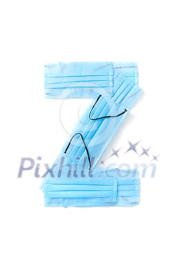 Capital letter Z handmade from medical antibacterial protective blue face masks on a white background, copy space. Creative alphabet for making up new words. Capital letter Z handmade from medical antibacterial protective blue face masks on a white background, copy space. Creative alphabet for making up new words.
