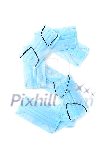 Capital letter S handmade from medical antibacterial protective blue face masks on a white background, copy space. Creative alphabet for making up new words. Capital letter S handmade from medical antibacterial protective blue face masks on a white background, copy space. Creative alphabet for making up new words.