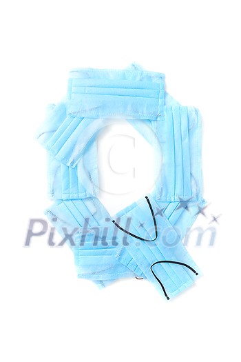 Capital letter Q handmade from medical antibacterial protective blue face masks on a white background, copy space. Creative alphabet for making up new words. Capital letter Q handmade from medical antibacterial protective blue face masks on a white background, copy space. Creative alphabet for making up new words.