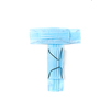 Capital letter T handmade from medical antibacterial protective blue face masks on a white background, copy space. Creative alphabet for making up new words.