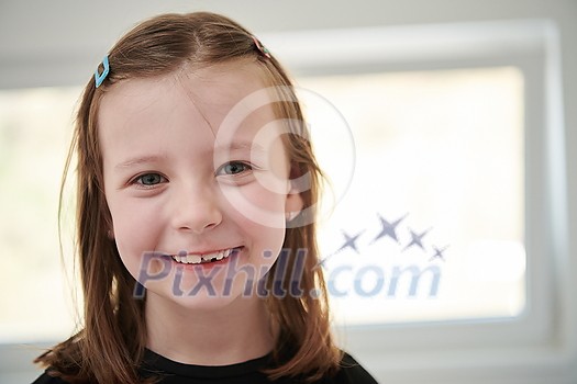 Funny little girl without tooth smiles showing gap close up Funny little girl without tooth smiles showing gap close up