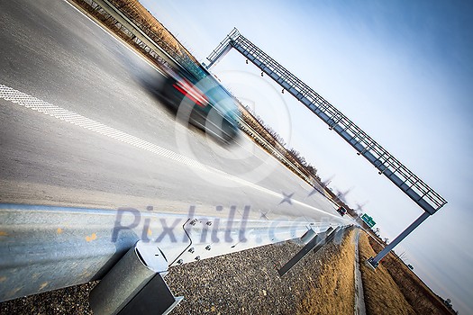 Highway traffic - motion blurred cars on a highway Highway traffic - motion blurred cars on a highway
