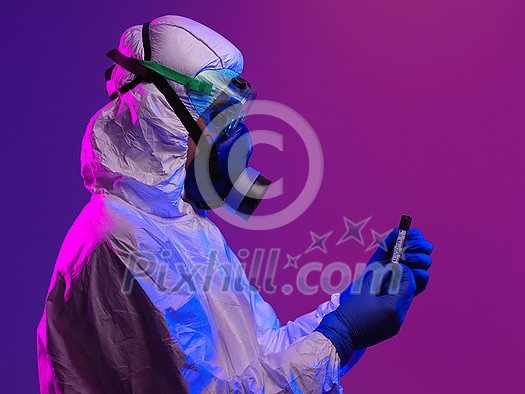Coronavirus, Doctor holding positive covid-19 virus Blood Sample tube. Wearing biohazard epidemic Protective mask, suit and glows. Coronavirus, Doctor holding positive covid-19 virus Blood Sample tube. Wearing biohazard epidemic Protective mask, suit and glows.
