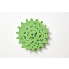 Handcarft set of machine gear from green color paper in the form of stack on a white background with soft shadows, copy space. Top view.