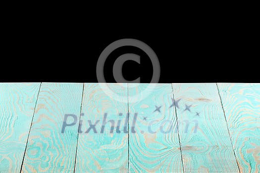 Natural light blue wooden textured empty backdrop on a black background, copy space. Blank wooden table. Can be used for your creativity. Natural light blue wooden textured empty backdrop on a black background, copy space. Blank wooden table. Can be used for your creativity.