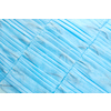 Medical creative background from antibacterial protective blue face masks diagonally arranged. Concept of prevention from respiratory sickness and viruses.