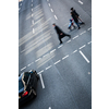 City business people crossing a street - motion blurred abstract background