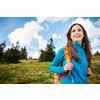 Pretty, young woman hiking outdoors in splendid alpine setting