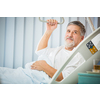 Senior male patient in a modern hospital (shallow DOF; color toned image)