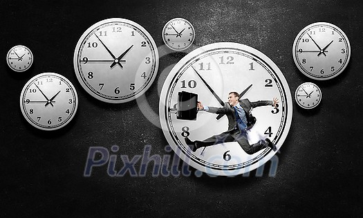 Concept of time with funny businessman running in a hurry Concept of time with funny businessman running in a hurry