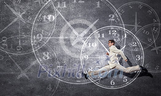 Concept of time with funny businessman running in a hurry Concept of time with funny businessman running in a hurry