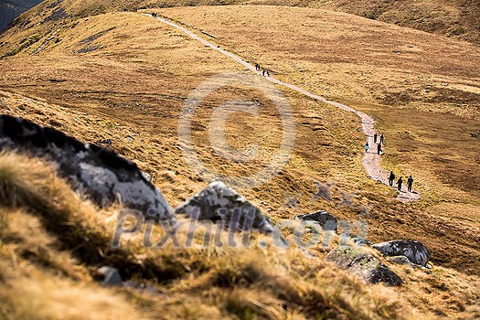 People hiking on the splendid Ben Nevis People hiking on the splendid Ben Nevis