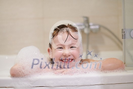 little girl playing with soap foam in bath during coronavirus stay at home pandemic quarantine little girl playing with soap foam in bath during coronavirus stay at home pandemic quarantine