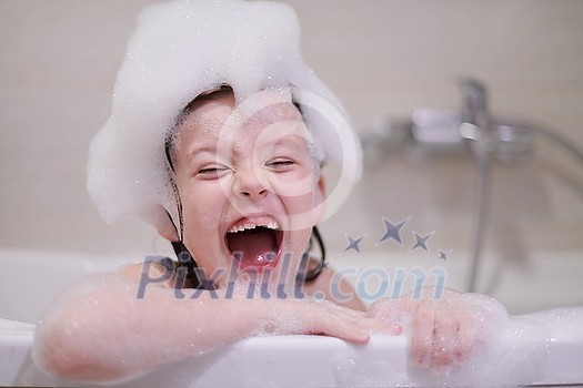 little girl playing with soap foam in bath during coronavirus stay at home pandemic quarantine little girl playing with soap foam in bath during coronavirus stay at home pandemic quarantine