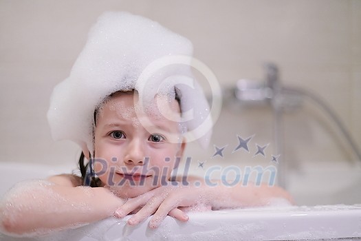 little girl playing with soap foam in bath during coronavirus stay at home pandemic quarantine little girl playing with soap foam in bath during coronavirus stay at home pandemic quarantine