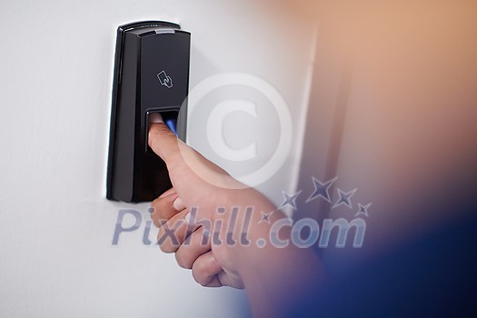 man pressing fingerprint scanner on alarm system indoors
Finger print scan for unlock door security system man pressing fingerprint scanner on alarm system indoors
Finger print scan for unlock door security system