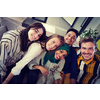 group of casual multiethnic business people during break from the work taking selfie picture while enjoying free time in relaxation area at modern open plan startup office