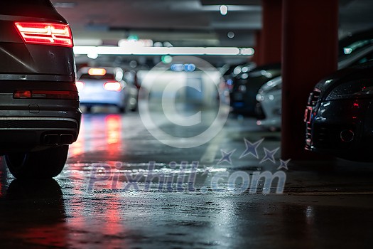 Underground parking/garage (shallow DOF; color toned image) Underground parking/garage (shallow DOF; color toned image)
