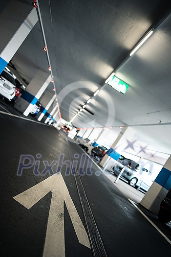 Underground parking/garage (shallow DOF; color toned image) Underground parking/garage (shallow DOF; color toned image)