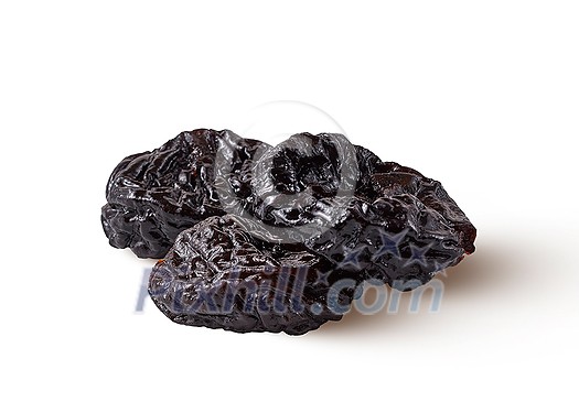 Close-up view heap of homemade natural organic sweet prune isolated on a white background with soft shadows, copy space. Vegetarian healthy food concept.